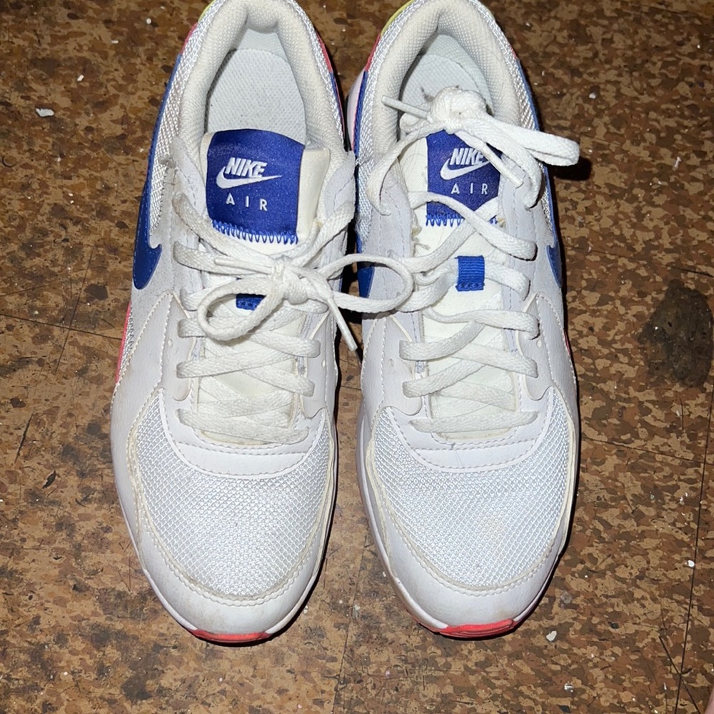 Boys slightly worn NIKE sneakers multi color white, gray, red and blue.